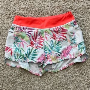 Athleta Tropical Leaf Athletic Shorts with Coral Waistband
